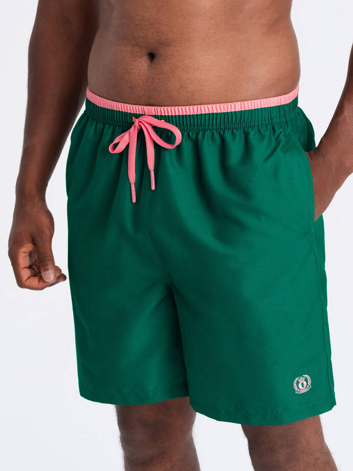 Pánské dvoubarevné žebrované plavecké šortky - tmavě zelené V3 OM-SRBS-0141